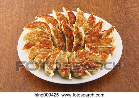 Gyoza dumplings View Large Photo Image Stock Photography - Gyoza dumplings. Fotosearch