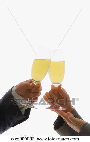 Stock Image - Japanese business people toasting. Fotosearch