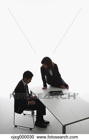 Japanese businessman being harassed by his boss View Large Photo Image Stock Image - Japanese businessman being harassed by his boss. Fotosearch
