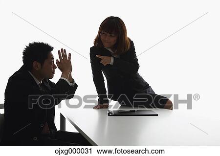 Japanese businessman being harassed by his boss View Large Photo Image Stock Image - Japanese businessman being harassed by his boss. Fotosearch