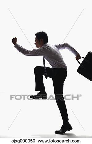 Japanese businessman sprinting View Large Photo Image Stock Image - Japanese businessman sprinting. Fotosearch