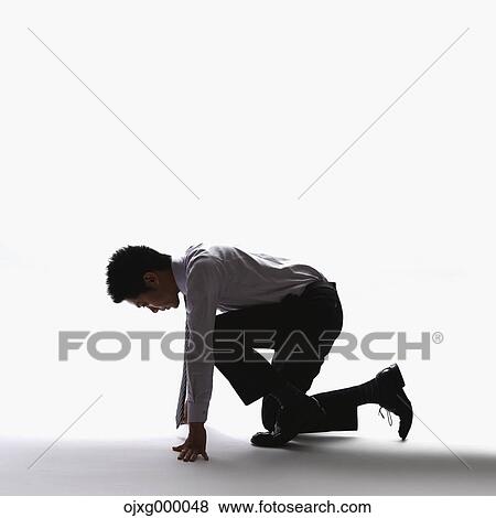 Japanese businessman sprinting View Large Photo Image Stock Photo - Japanese businessman sprinting. Fotosearch