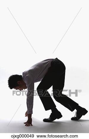 Japanese businessman sprinting View Large Photo Image Stock Photo - Japanese businessman sprinting. Fotosearch