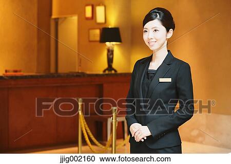 Japanese female hotel concierge View Large Photo Image Stock Image - Japanese female hotel concierge. Fotosearch
