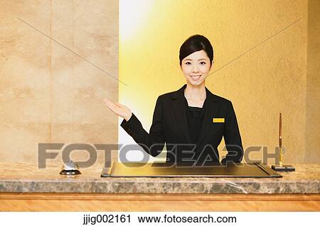 Japanese female hotel concierge View Large Photo Image Stock Image - Japanese female hotel concierge. Fotosearch