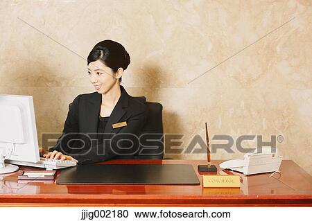 Japanese female hotel concierge View Large Photo Image Stock Image - Japanese female hotel concierge. Fotosearch