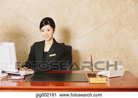 Japanese female hotel concierge View Large Photo Image Stock Image - Japanese female hotel concierge. Fotosearch