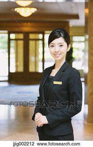 Japanese female hotel concierge View Large Photo Image Stock Image - Japanese female hotel concierge. Fotosearch