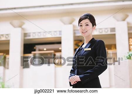 Japanese female hotel concierge View Large Photo Image Stock Image - Japanese female hotel concierge. Fotosearch