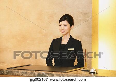 Japanese female hotel concierge View Large Photo Image Stock Photo - Japanese female hotel concierge. Fotosearch