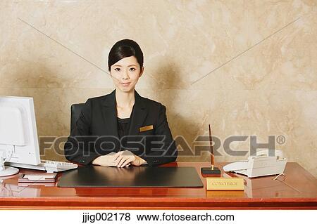 Japanese female hotel concierge View Large Photo Image Stock Photo - Japanese female hotel concierge. Fotosearch