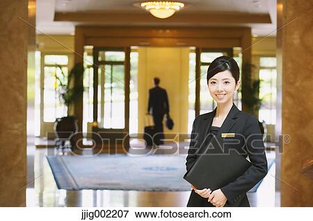 Japanese female hotel concierge View Large Photo Image Stock Photo - Japanese female hotel concierge. Fotosearch