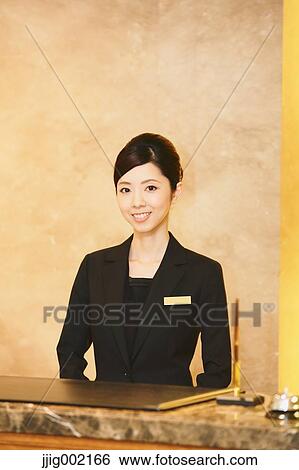 Japanese female hotel concierge View Large Photo Image Stock Photograph - Japanese female hotel concierge. Fotosearch