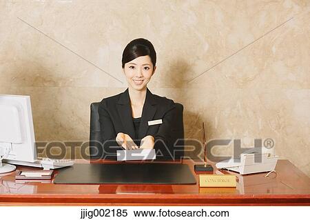 Japanese female hotel concierge View Large Photo Image Stock Photography - Japanese female hotel concierge. Fotosearch