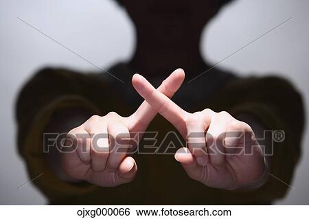 Japanese gesture for no View Large Photo Image Stock Photograph - Japanese gesture for no. Fotosearch