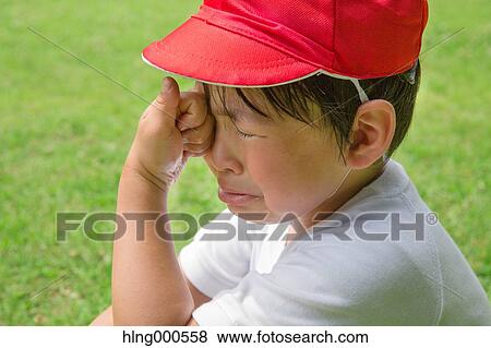 Japanese kid crying in a park View Large Photo Image Stock Photo - Japanese kid crying in a park. Fotosearch