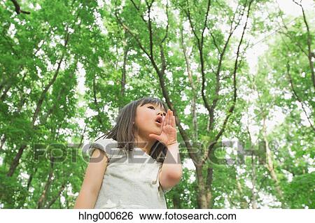 Stock Photograph - Japanese kid in a park. Fotosearch