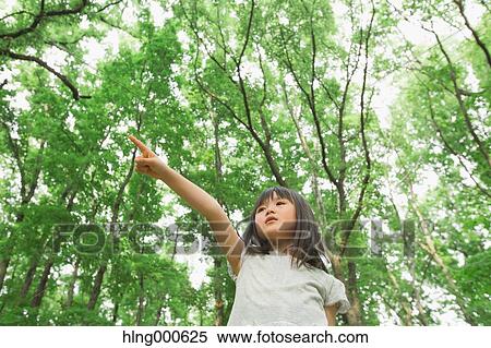 Stock Photography - Japanese kid in a park. Fotosearch