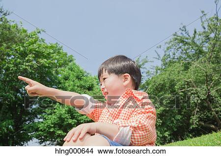 Japanese kid playing in a park View Large Photo Image Picture - Japanese kid playing in a park. Fotosearch