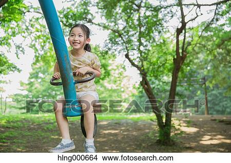Japanese kid playing in a park View Large Photo Image Picture - Japanese kid playing in a park. Fotosearch