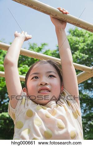 Japanese kid playing in a park View Large Photo Image Stock Image - Japanese kid playing in a park. Fotosearch