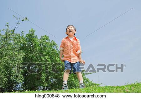 Japanese kid playing in a park View Large Photo Image Stock Photo - Japanese kid playing in a park. Fotosearch