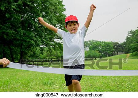 Japanese kid running in a park View Large Photo Image Stock Photo - Japanese kid running in a park. Fotosearch