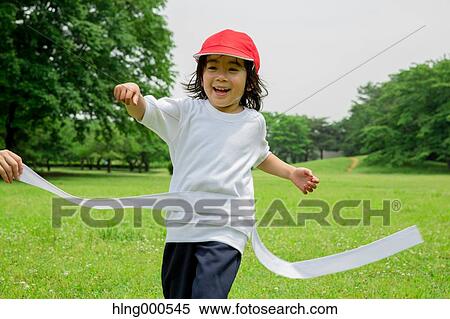 Japanese kid running in a park View Large Photo Image Stock Photography - Japanese kid running in a park. Fotosearch