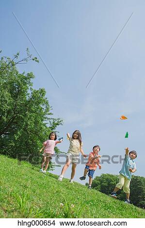Japanese kids playing in a park View Large Photo Image Picture - Japanese kids playing in a park. Fotosearch