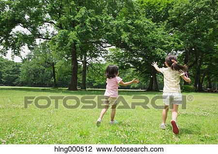 Japanese kids playing in a park View Large Photo Image Stock Image - Japanese kids playing in a park. Fotosearch