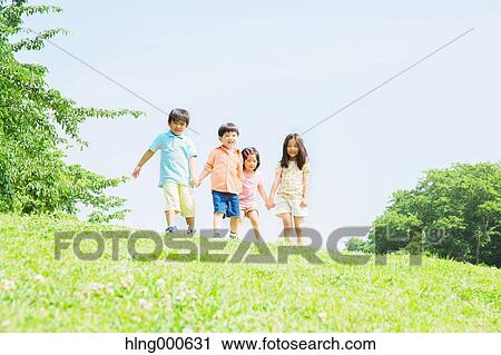 Japanese kids playing in a park View Large Photo Image Stock Image - Japanese kids playing in a park. Fotosearch