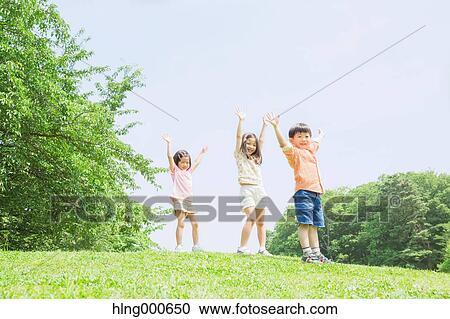 Japanese kids playing in a park View Large Photo Image Stock Image - Japanese kids playing in a park. Fotosearch