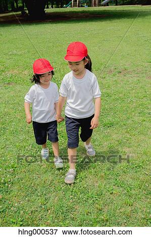 Japanese kids playing in a park View Large Photo Image Stock Photo - Japanese kids playing in a park. Fotosearch