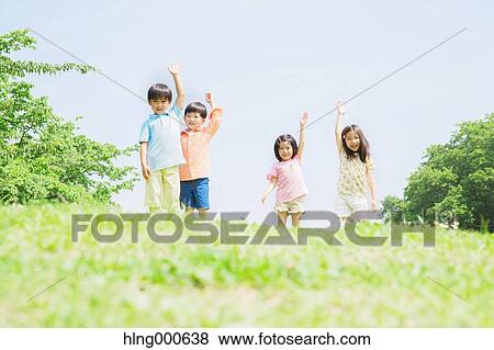 Japanese kids playing in a park View Large Photo Image Stock Photo - Japanese kids playing in a park. Fotosearch