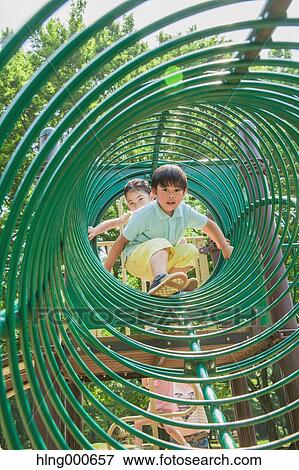 Stock Photo - Japanese kids playing in a park. Fotosearch