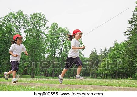 Stock Photography - Japanese kids playing in a park. Fotosearch