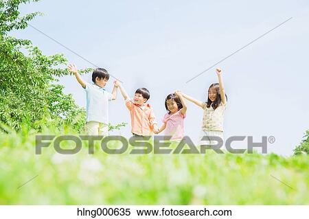 Japanese kids playing in a park View Large Photo Image Stock Photography - Japanese kids playing in a park. Fotosearch