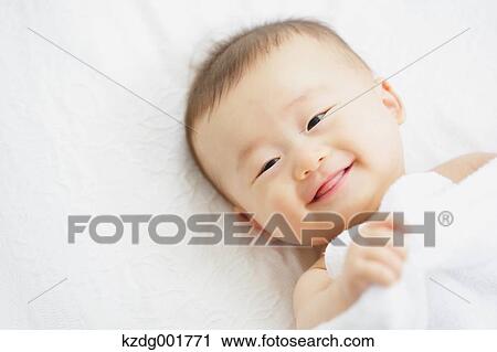 Stock Image - Japanese newborn portrait. Fotosearch