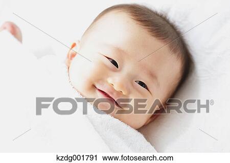 Stock Image - Japanese newborn portrait. Fotosearch