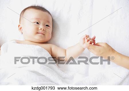 Stock Image - Japanese newborn portrait. Fotosearch
