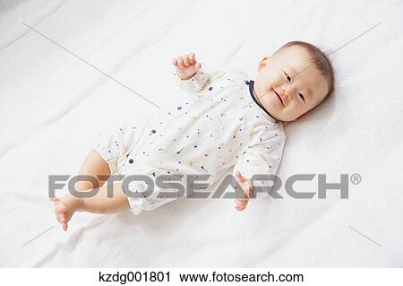 Stock Image - Japanese newborn portrait. Fotosearch