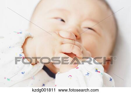 Stock Image - Japanese newborn portrait. Fotosearch