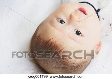 Stock Photo - Japanese newborn portrait. Fotosearch