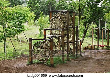 Kids Playground In A Park Stock Photo Kzdg001659 Fotosearch
