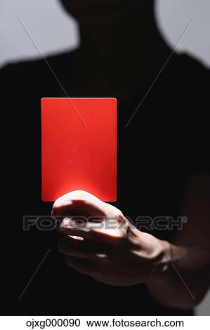 Man holding red card View Large Photo Image Stock Image - Man holding red card. Fotosearch