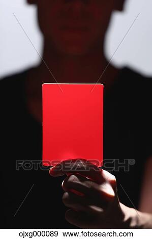 Man holding red card View Large Photo Image Stock Photo - Man holding red card. Fotosearch