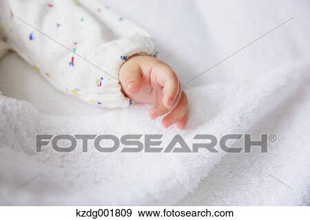 Stock Photo - Newborn hand. Fotosearch