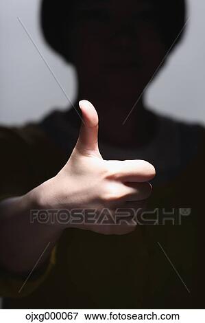 Stock Photo - Thumbs up gesture. Fotosearch