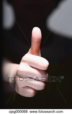 Thumbs up gesture View Large Photo Image Stock Photo - Thumbs up gesture. Fotosearch