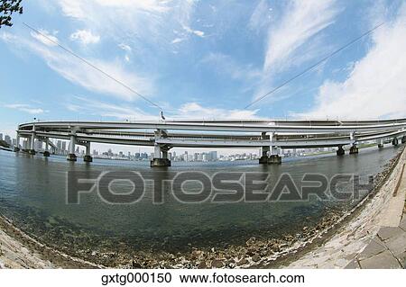 Stock Image - "View of Rainbow Bridge, Tokyo, Japan". Fotosearch